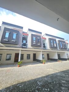 Modern luxury terrace duplex with spacious parking area and contemporary exterior design